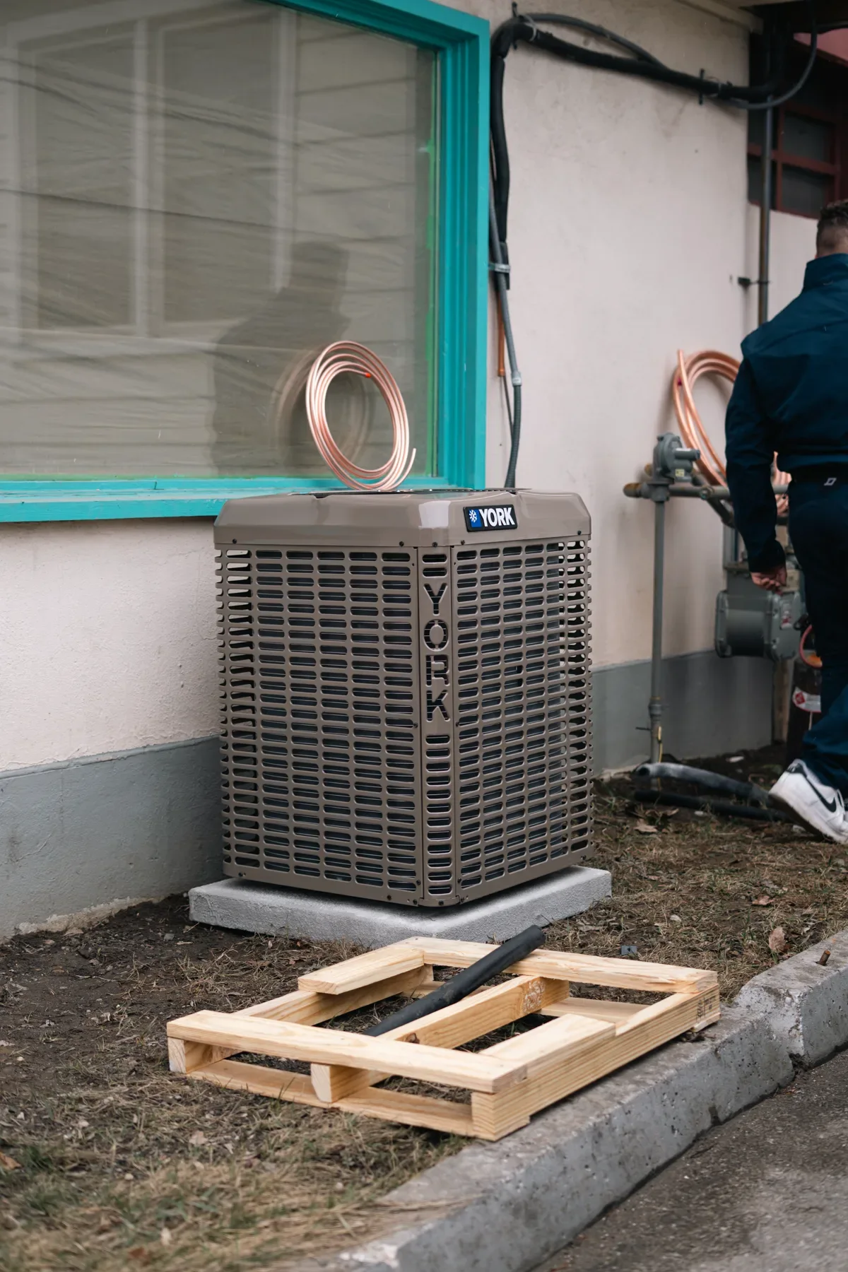 Completed residential outdoor air-conditioning unit installation