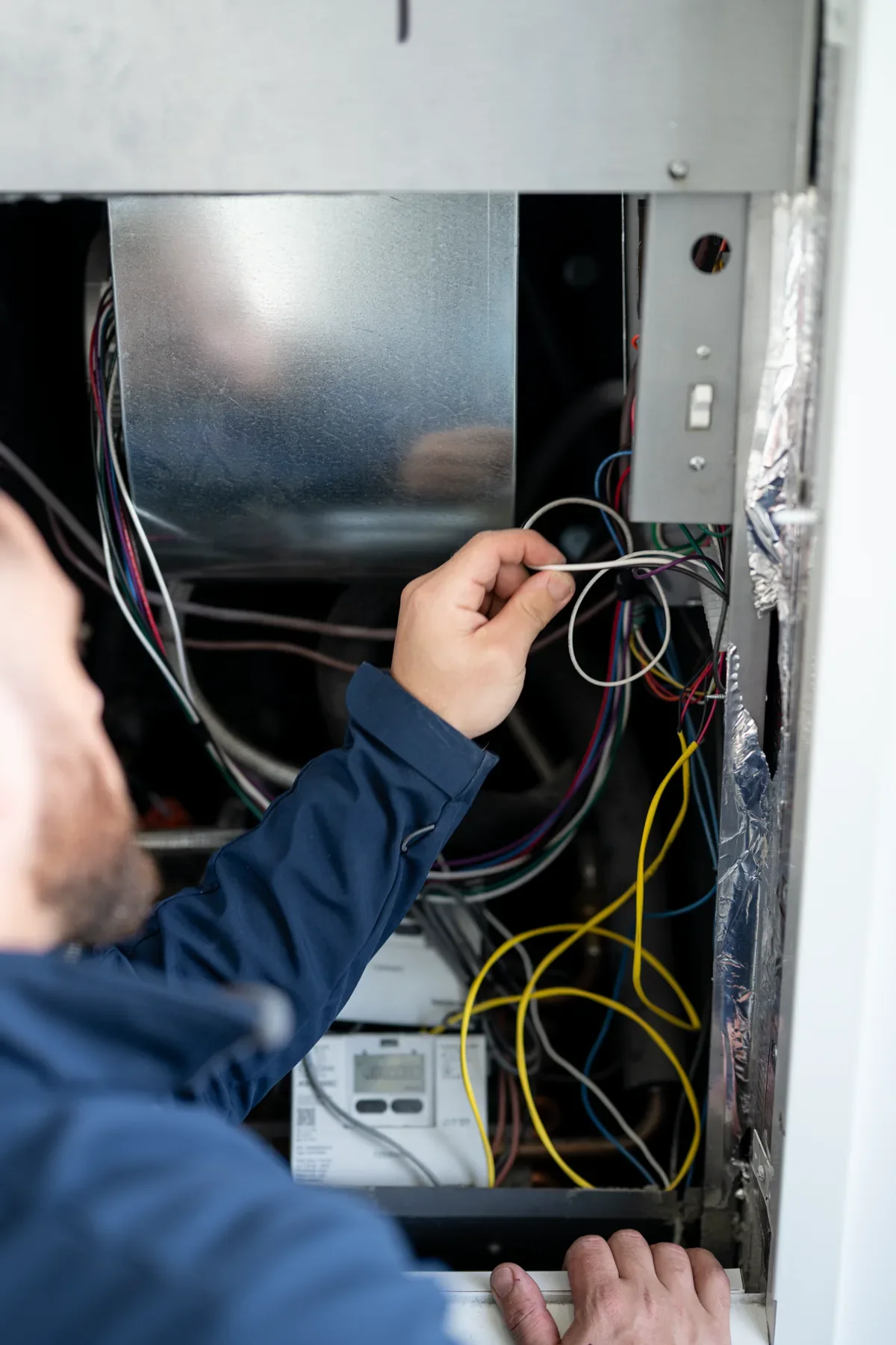 Close-up of fan-coil wiring diagnostics