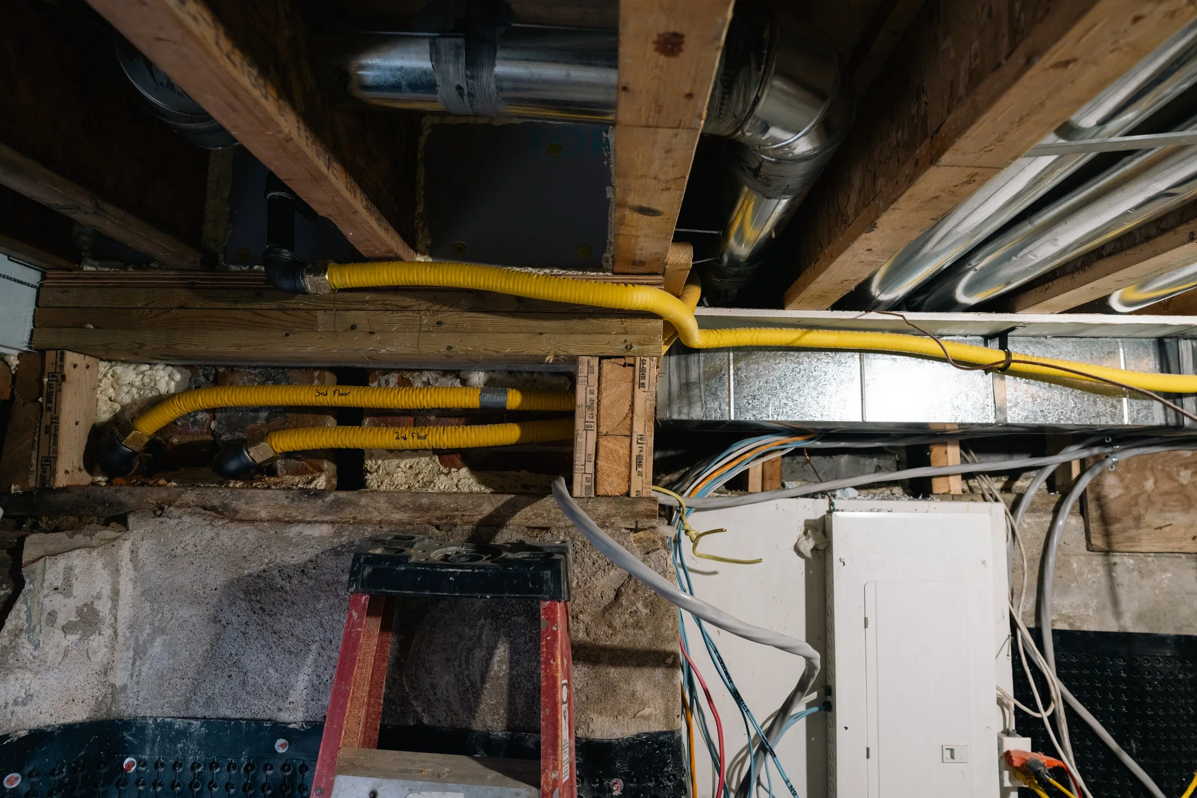 Mechanical-room gas-line routing and installation detail