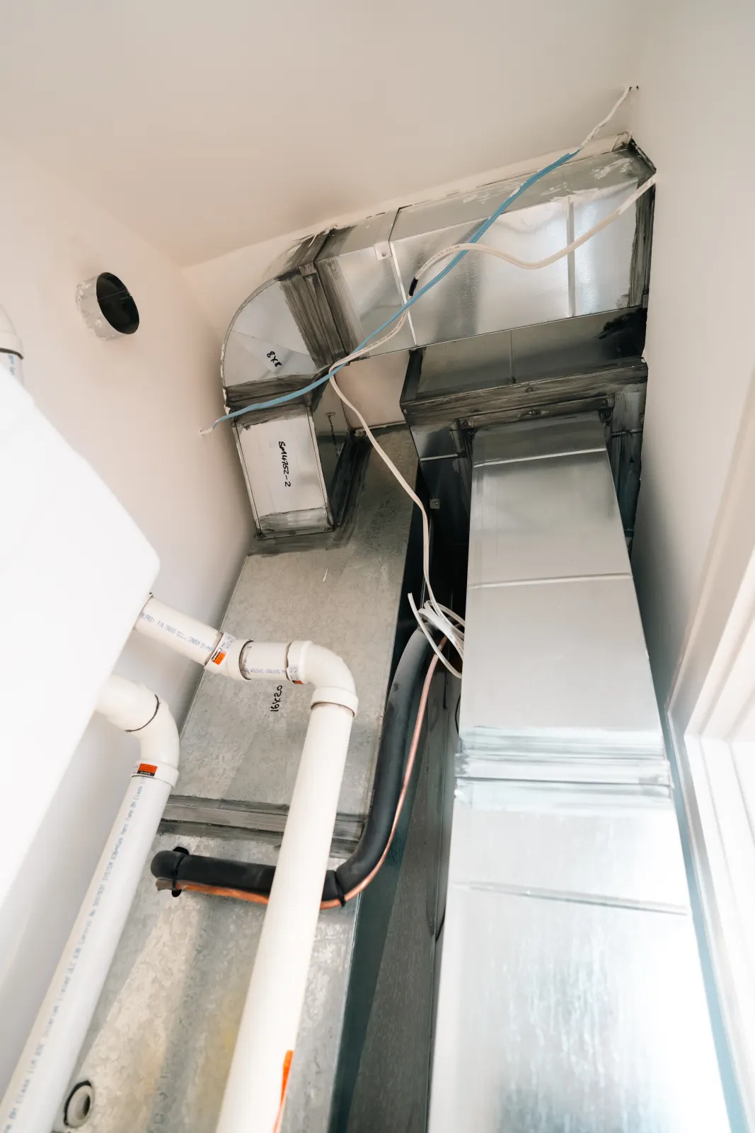 Residential furnace and sheet-metal ductwork installation