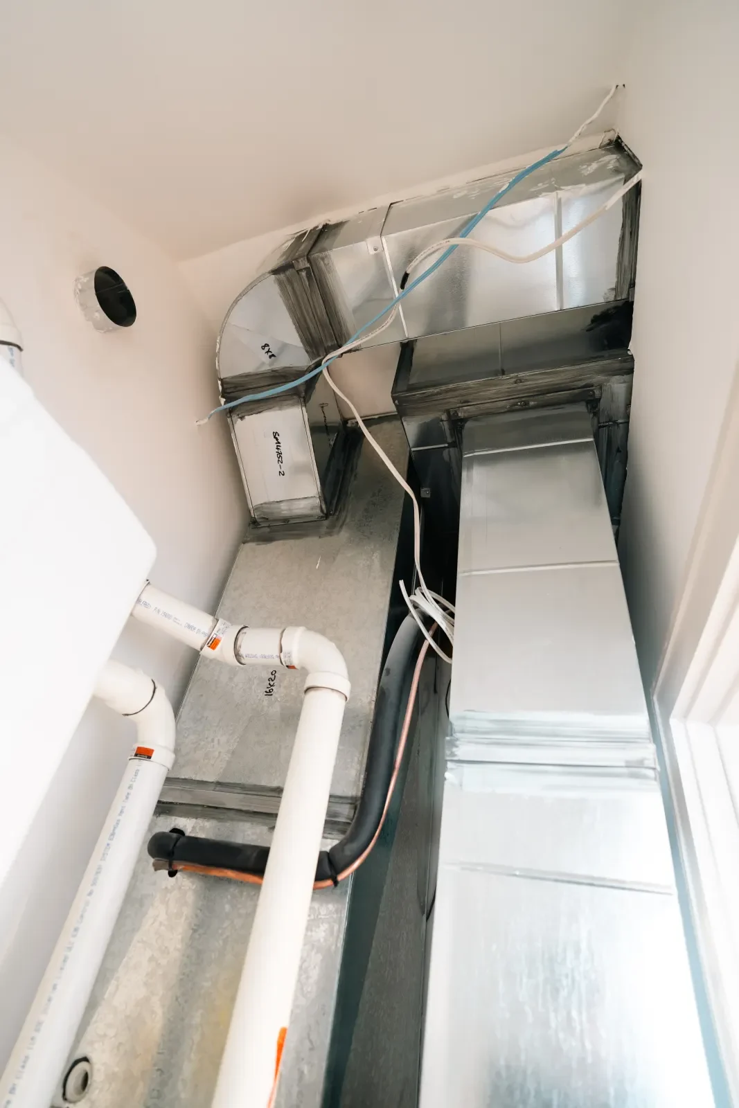 Residential furnace and sheet-metal ductwork installation