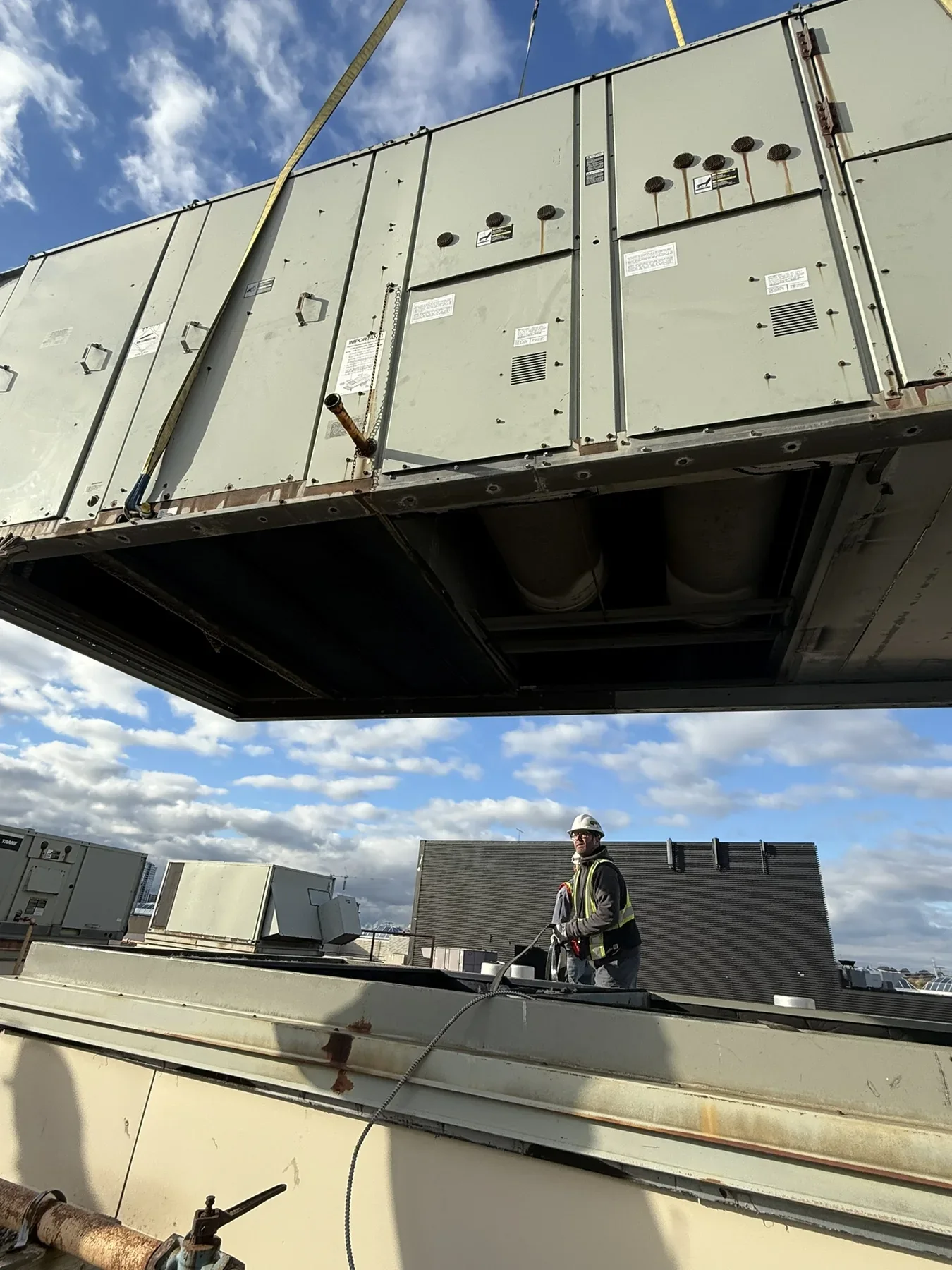Commercial rooftop HVAC units during field service