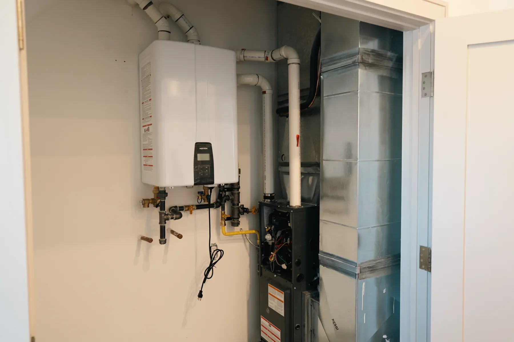 Wide view of a completed tankless water-heater system